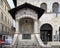 Small outdoor chapel with an ancient fresco of Madonna and Child in Assisi, italy.