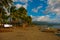 A small outrigger style Banca boat rests on a tropical beach.Pandan, Panay, Philippines.