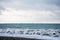 A small oyster and mussel farm on The black sea coast. Farm structures are visible in the sea, and a wave storm 4 points Is in the