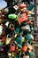 Small padlocks are locked on a pole on a bridge in Amsterdam.