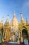 Small pagodas and Shwedagon Pagoda in Yangon