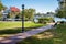 Small Park alongside a Harbor on a Sunny Autumn Day