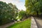 A small park on Toompea Hill offers a glimpse of the medieval stone wall and turrets of the walled city of Tallinn, Estonia