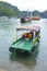 Small passenger ferry docked in a bay