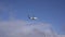 A small passenger plane lands over a park in Reykjavik, Iceland in the sky.