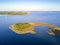 Small peninsula with pine trees, Mazury district lake, Poland