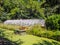 Small picnic area next to an old greenhouse in the