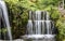 A small picturesque waterfall in the village of Argirupoli on the island of Crete,