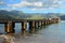 A small pier juts out into Hanalei Bay