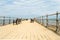 Small pier with ornate benches at Swanage in Dorset