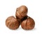 A small pile of peeled hazelnuts on a white isolated background. Side view. Close-up.