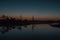 Small pine trees reflecting in pond of a marsh. Kemeri national park