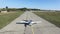 Small plane moves down the runway