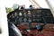 Small plane on the runway, airplane barn, Cockpit of small private lightweight vintage airplane closeup image