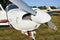 Small plane on the runway, airplane barn, Engine and propeller of small private lightweight vintage airplane closeup