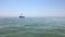 Small pleasure boat sailing over the waters of the Black Sea