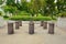 Small poles with tree and flowers in the Benjakiti Park at Bangkok.