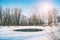 Small polynya on a small lake on a sunny day