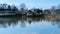 A small pond with a gazebo reflecting in the water, on a beautiful, calm and quiet day, Lancaster County, PA