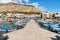 Small port with fishing boats in the center of Mondello, Palermo, Sicily