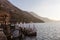 Small port of a town on Lake Como with storage of fishing boats