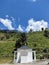 Small prayer room with hilly scenery in the background