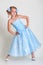 Small pretty model in blue dress