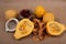 Small pumpkins, dried apples and cranberries on brown paper background.