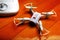 Small Quadrocopter drone robot studio work white