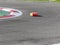 Small radio controlled model car on the track . Miniature remote controlled sport racing cars hobby