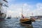 Small recreation boat is sailing during the great nautical event SAIL 2015.