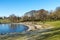 Small recreational public park and beach with frozen waters of Hafrsfjord fjord near Sword in Rock monument