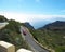 Small red car on the road to Masca