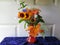 Small Red Glass Vase Wildflowers & Yellow Daylilies Greenery