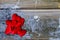 Small red hearts lying together on wooden background