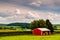 Small red stable and view of farms in Southern York County, Penn