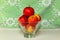 Small red-yellow apples in a vase.white background