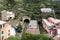 Small regional train station, located between mountains, at Riomaggiore town in Cinque Terre national park, Italy