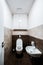 Small restroom with white accessories