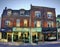 Small retail shops on Yonge street in Toronto during sunset