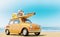 Small retro car with baggage, luggage and beach equipment on the roof, fully packed, ready for summer vacation, concept of a road