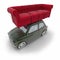 Small retro car carrying a sofa