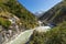 Small river with Ama Dablam mountain background, Everest region, Nepal