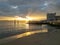 small river beach at pier of the columns in terreiro do paÃ§o or Commerce square with the 25 de Abril bridge in the distance