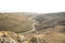 Small river and hills in prairie