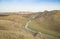 Small river and hills in prairie