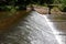 Small river sluice in summer detail photography