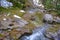 Small river in Strazyska valley in summer. Tatra mountains in Poland, Europe