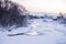 A small river in winter . Winter landscape. Water in rivers. Winter trees. Snow