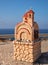 Small roadside chapel (Proskinitari) on the Petra tou Romiou Viewpoint. Limassol. Cyprus